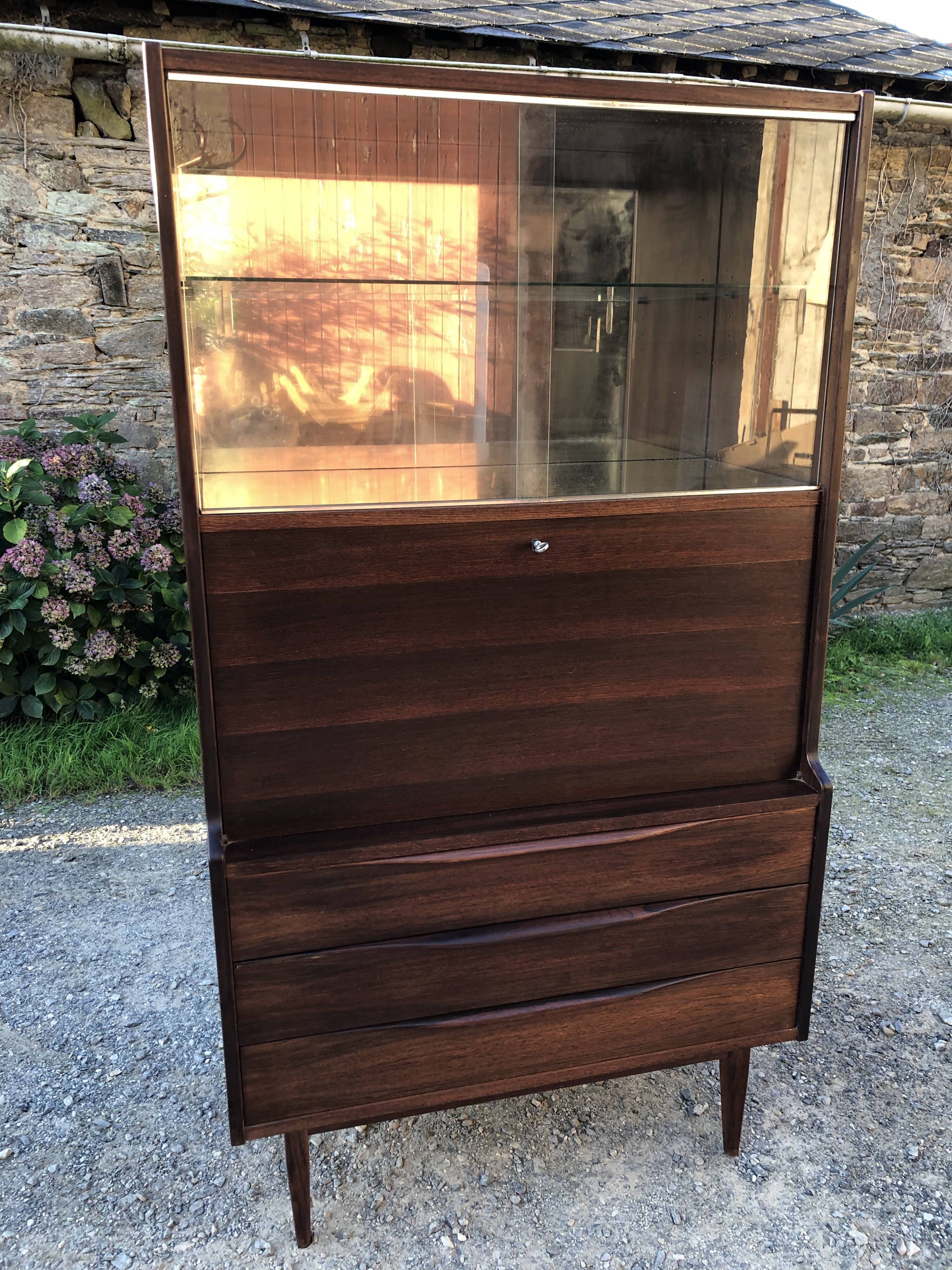 Vintage Scandinavian secretary in rosewood with drawers featuring fin-style handles.