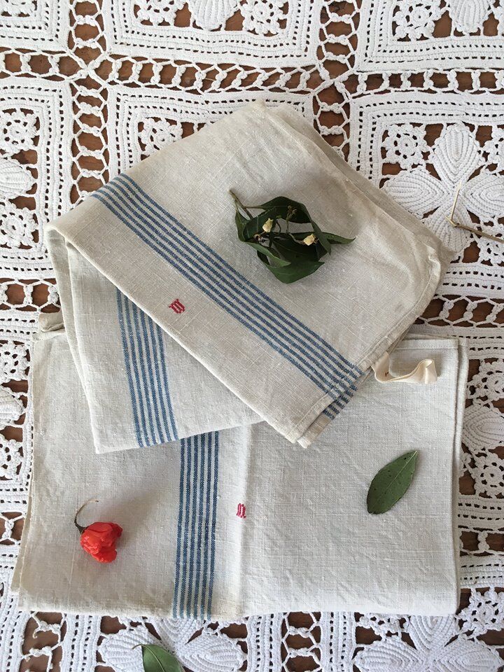 Pair of old dishcloths at marked blue stripes m.