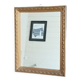 Mirror carved carved patinated gilded wood