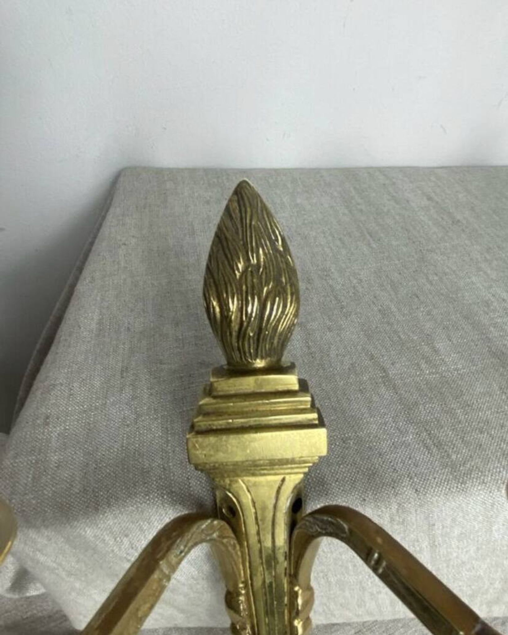 Pair of wall candle holders in bronze