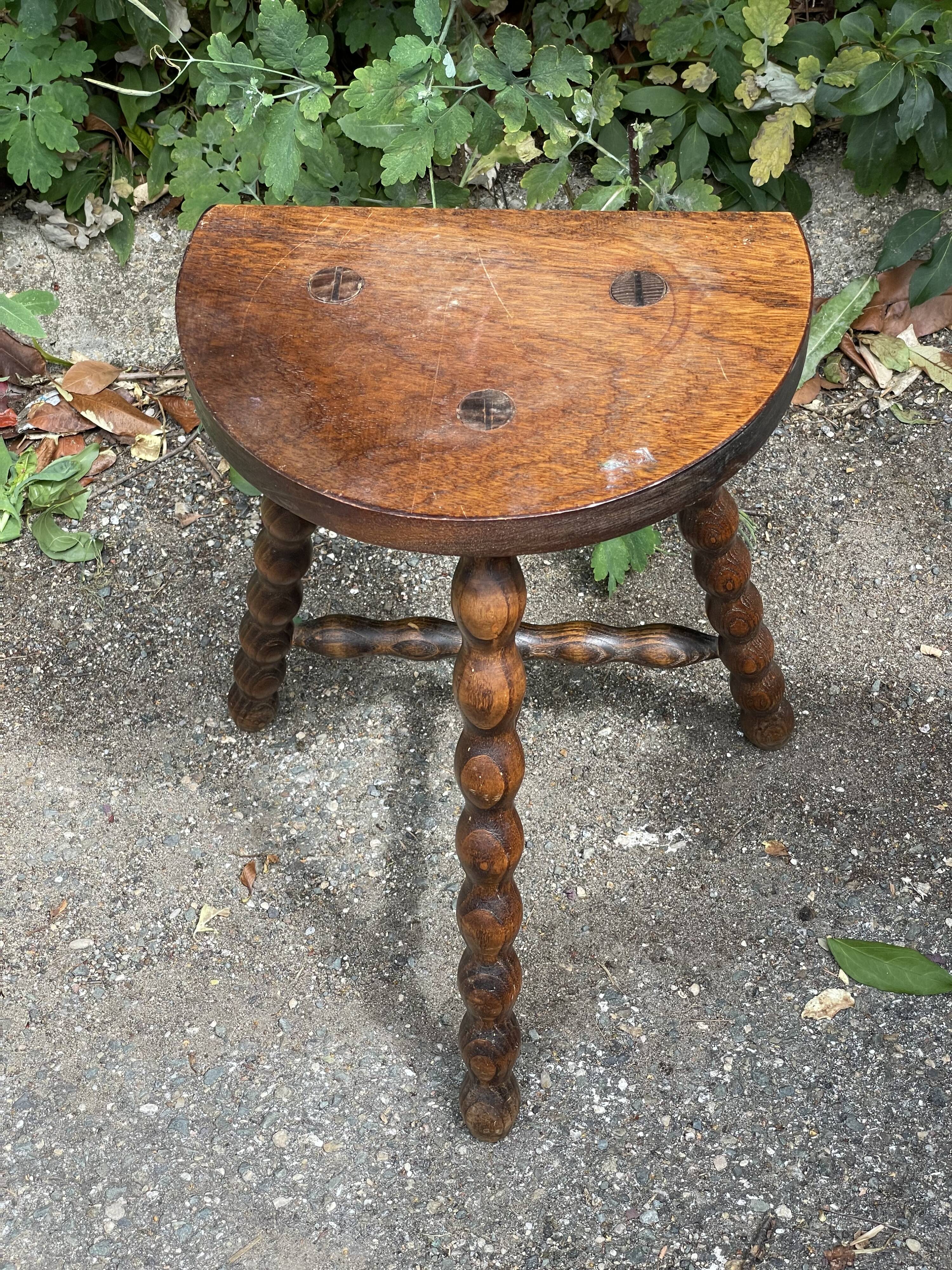 Wooden tripod stool