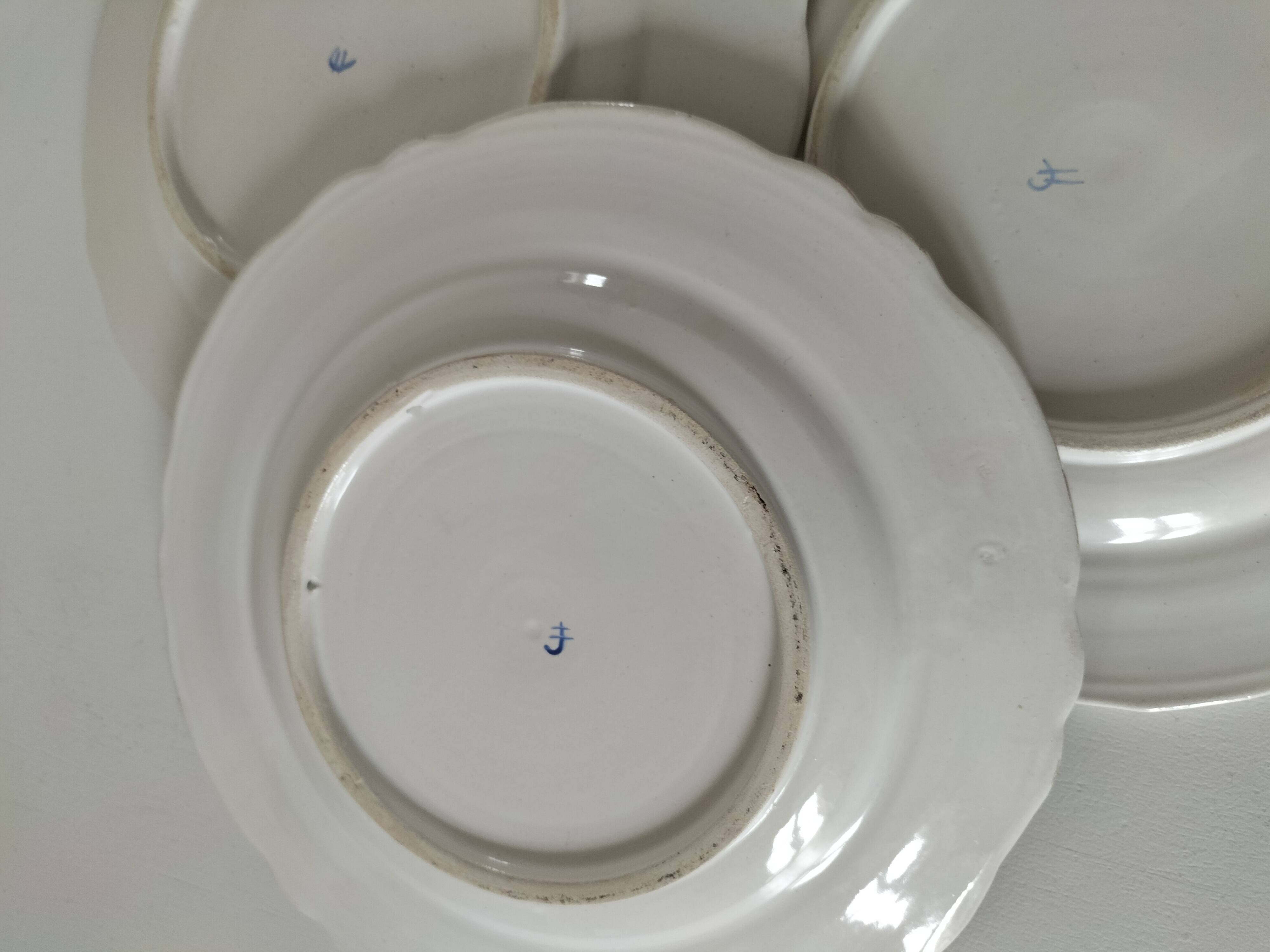 Trio of antique hand-painted plates