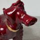 Chien en céramique bordeaux et doré