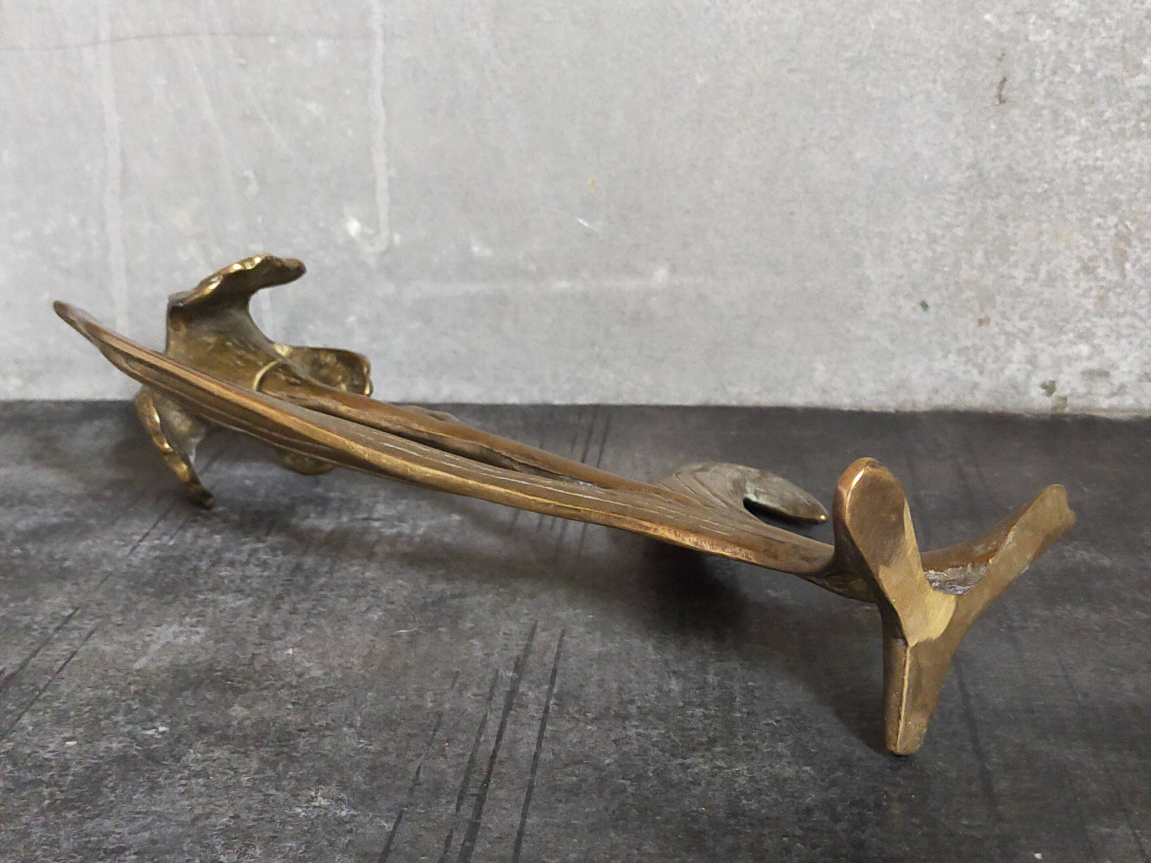 Old iris flower candle holder in solid brass