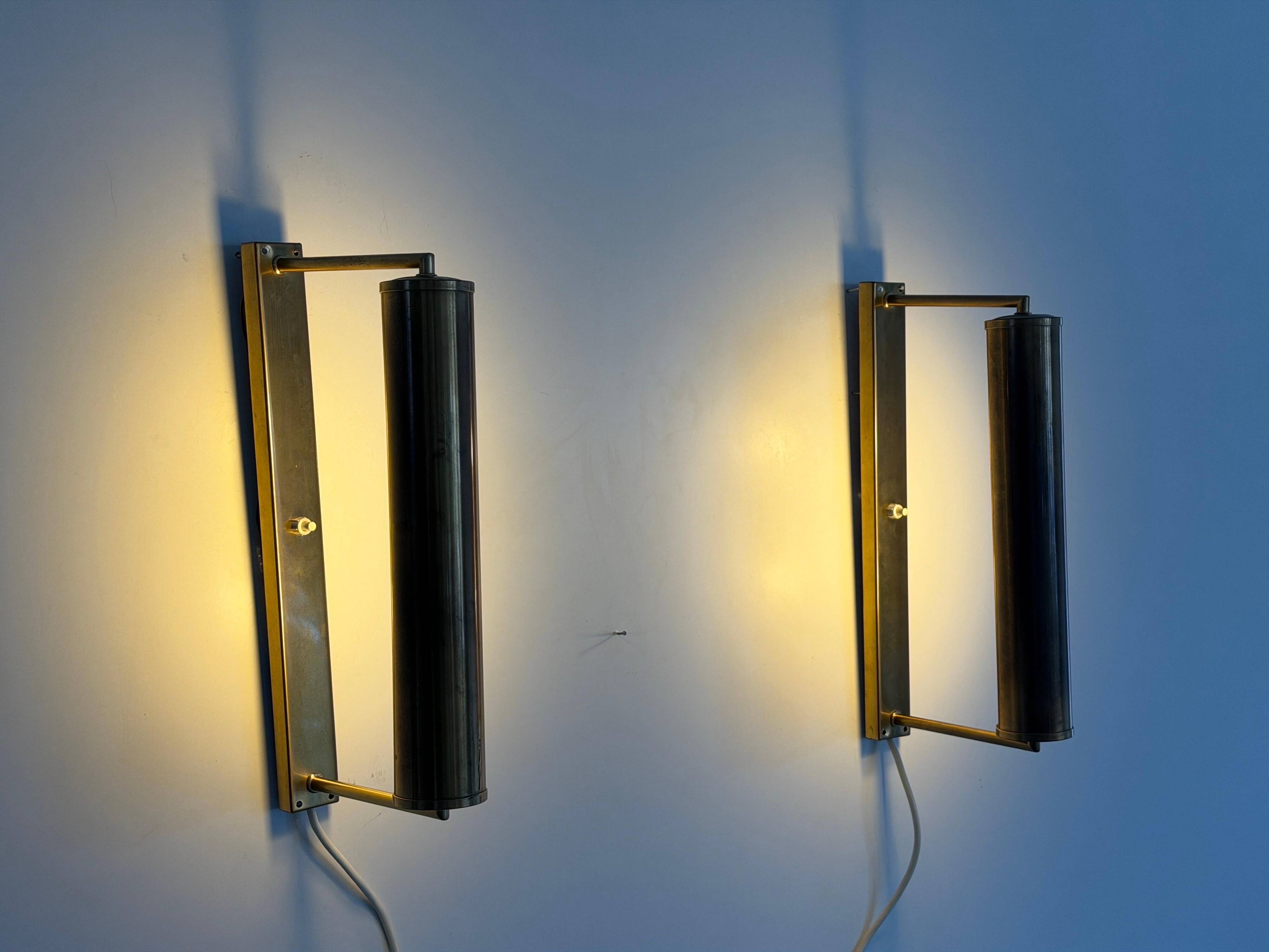 Pair of brass wall lights with adjustable heads from the mid-20th century, 1960, Germany.