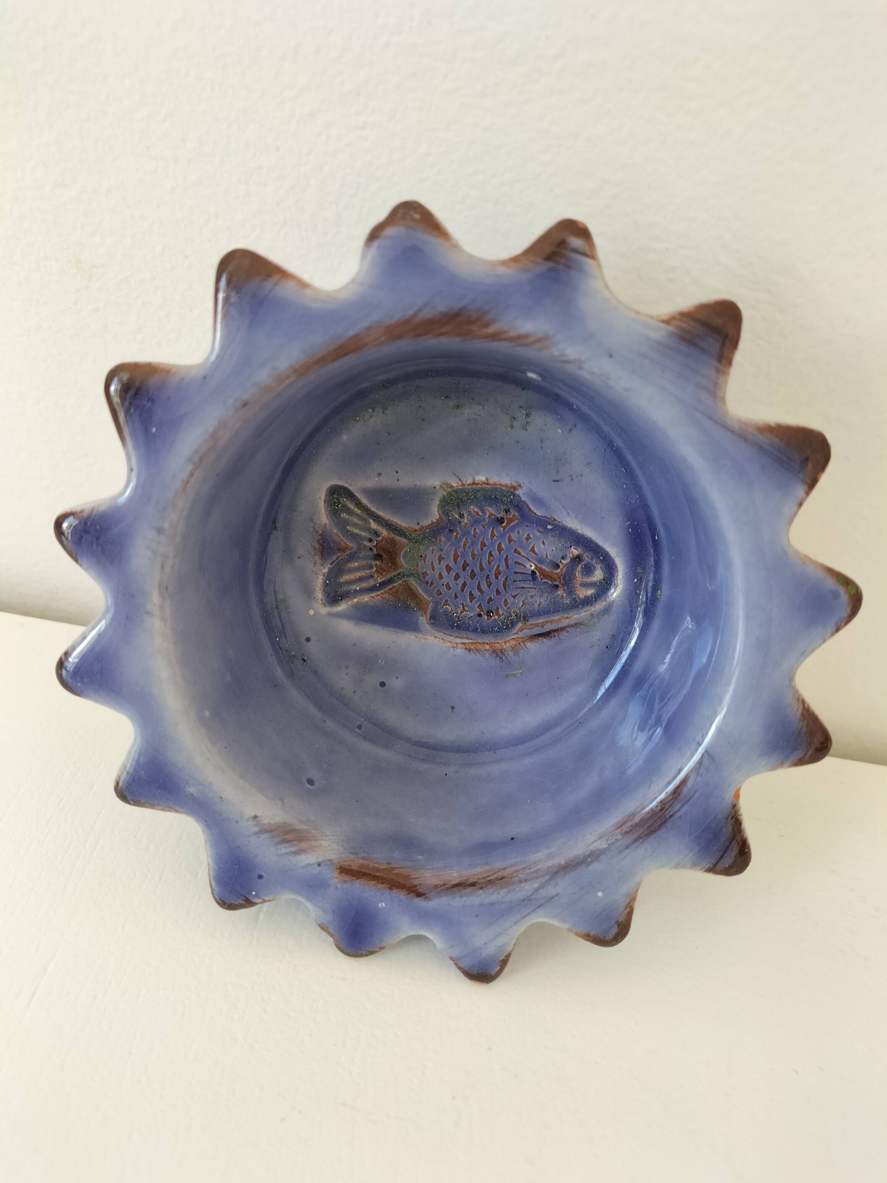 Handcrafted blue earthenware pocket emptier