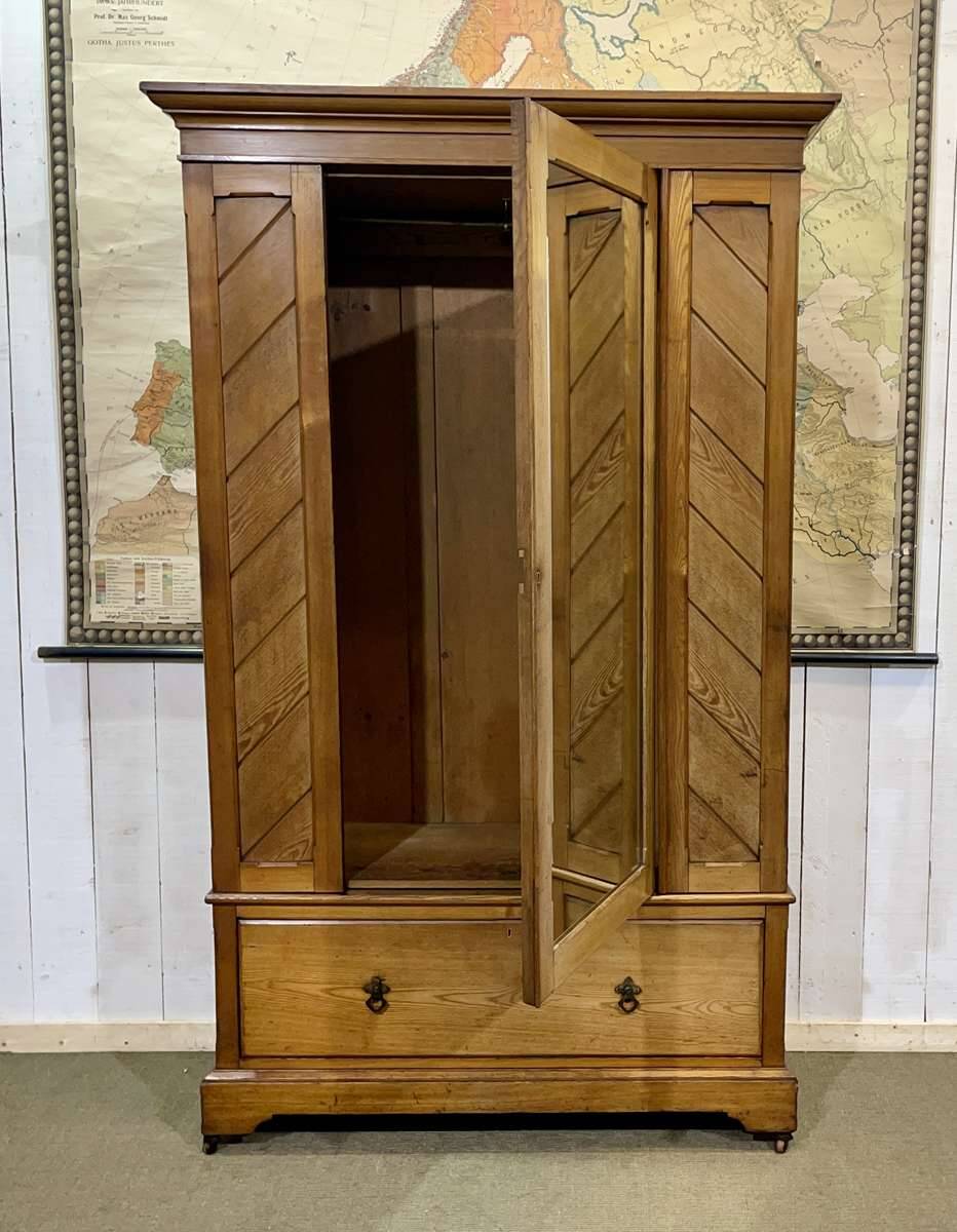English oak wardrobe from the early 20th century.