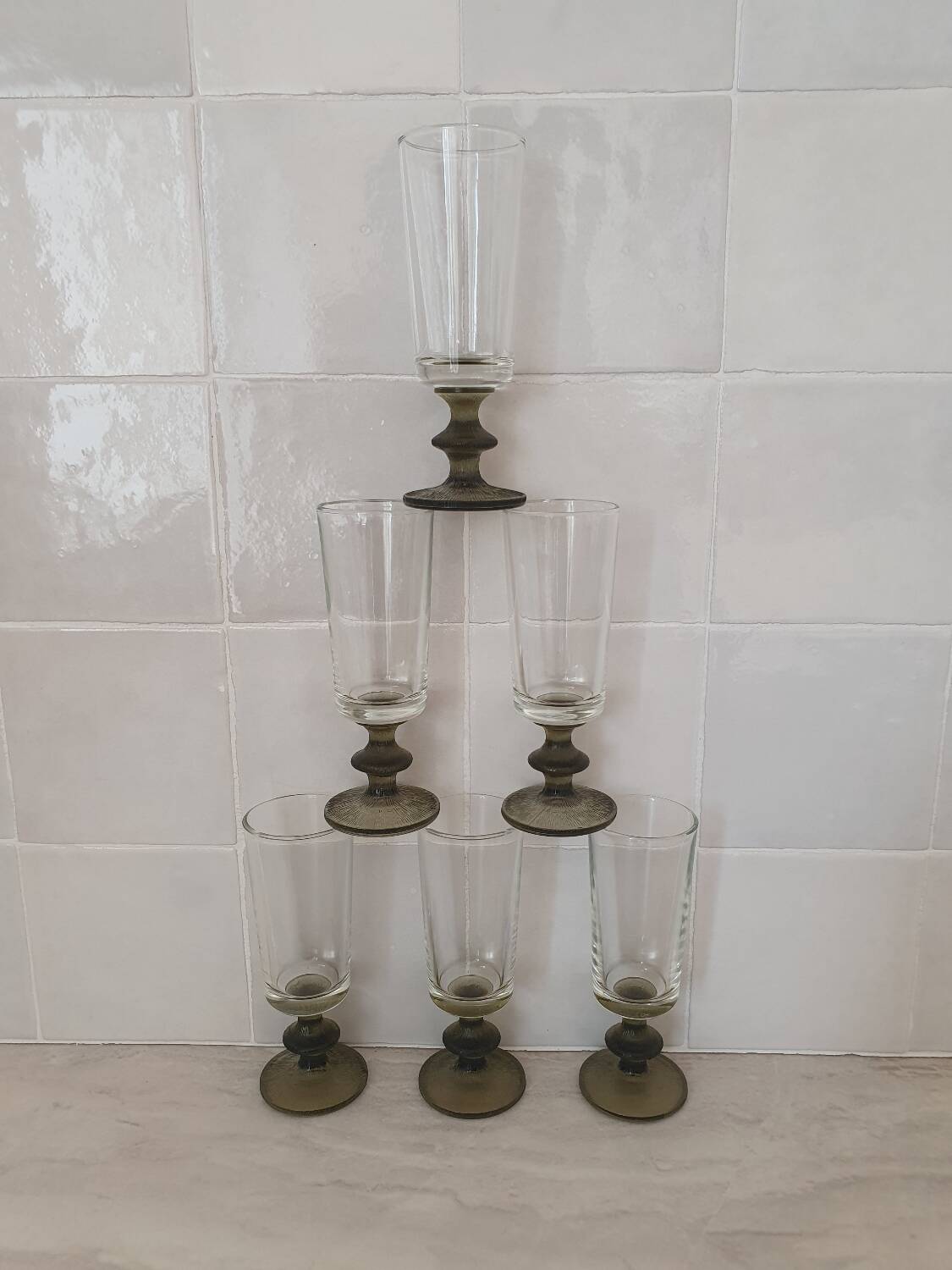 6 small green foot flutes in the Timo Sarpaneva style