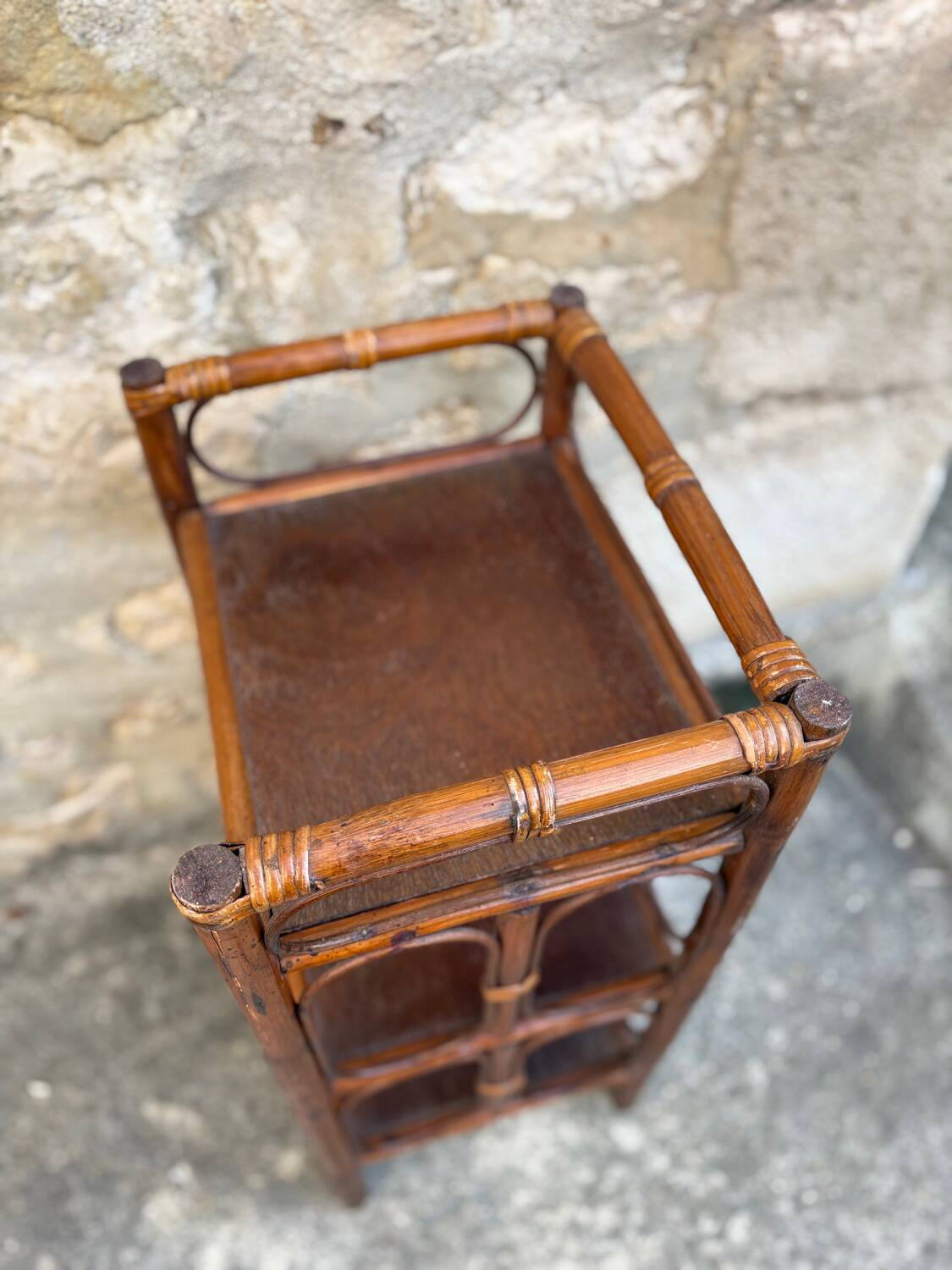 Dark brown bamboo shelf on legs
