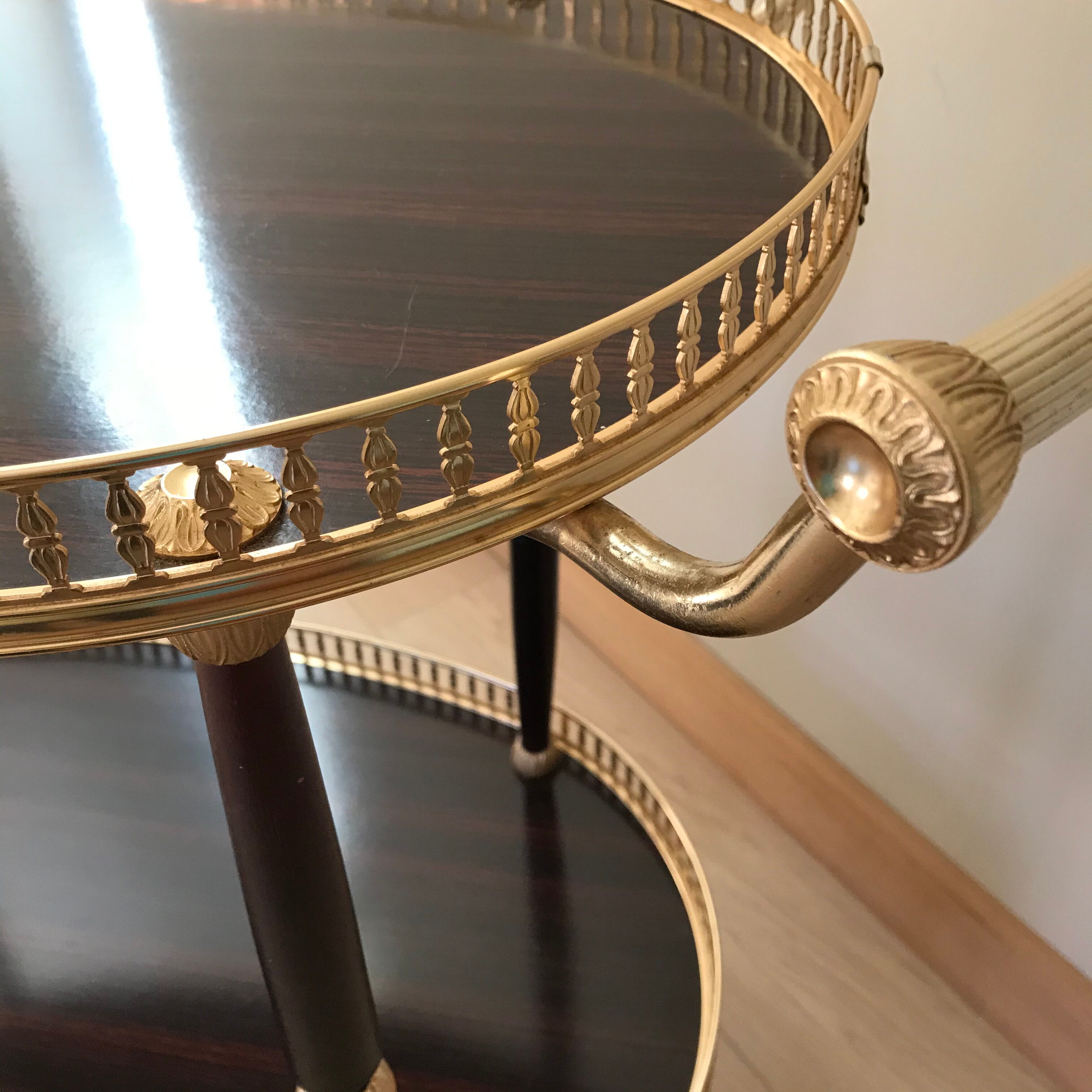 Golden wheeled serving trolley