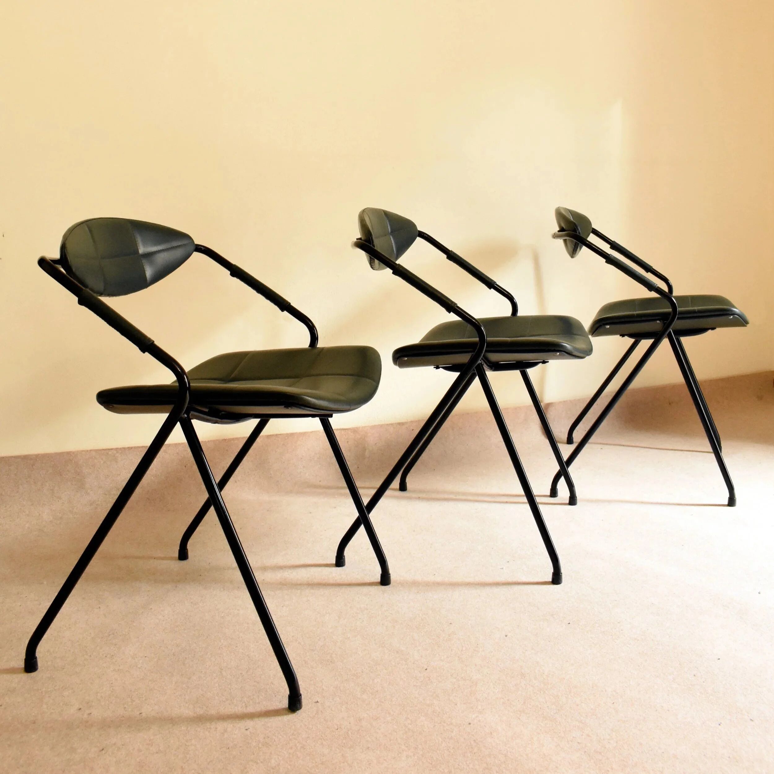Set of three "Rugby" model chairs by Gilbert Steiner for Steiner, 1962.