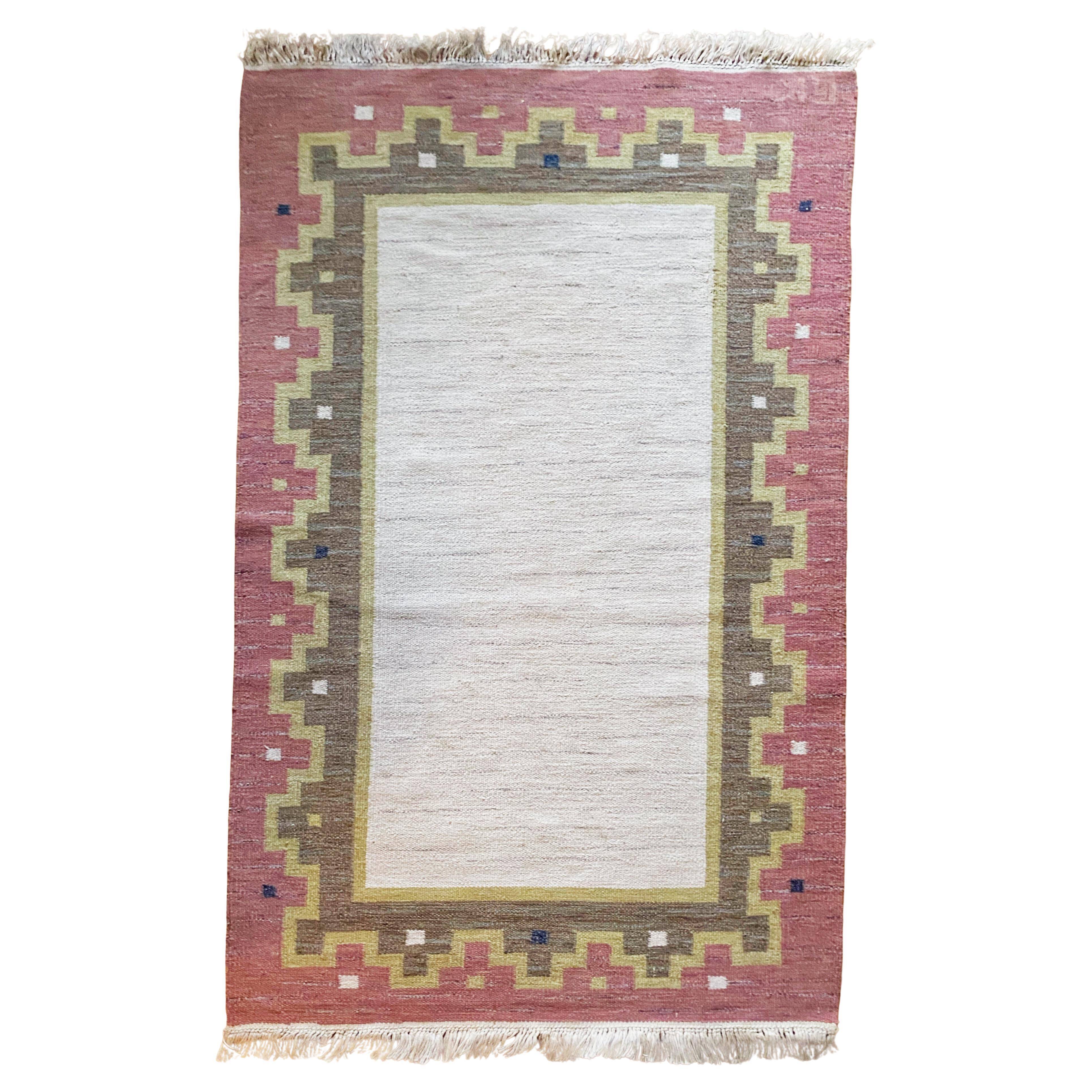 Tapis à tissage plat Röllakan rose et blanc moderne scandinave, Suède, années 1960.