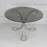 Living room table "Space Age" polished steel, circular slab smoked glass. France, circa 1970.