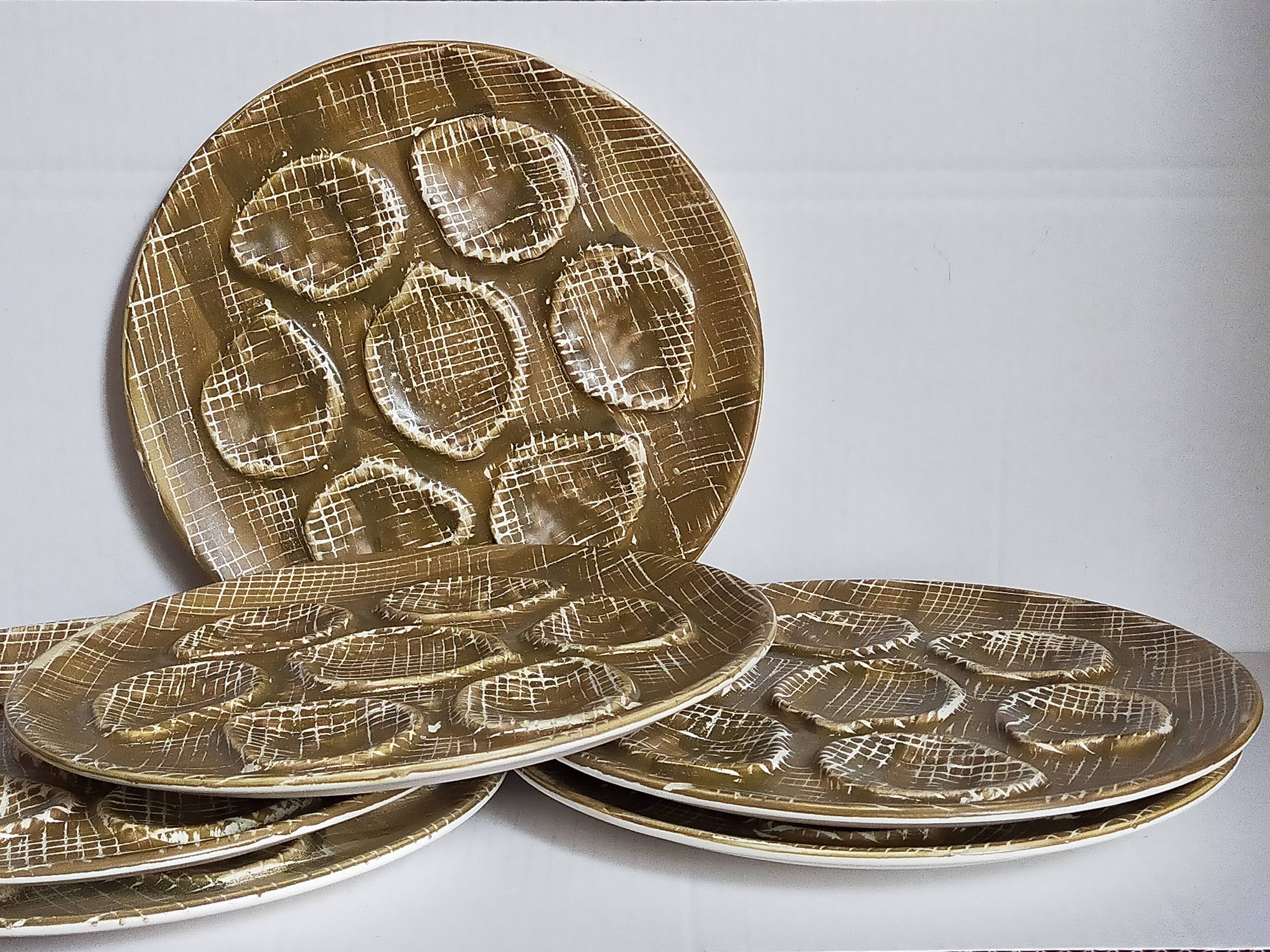 Six oyster plates earthenware with matte enamel, 50s