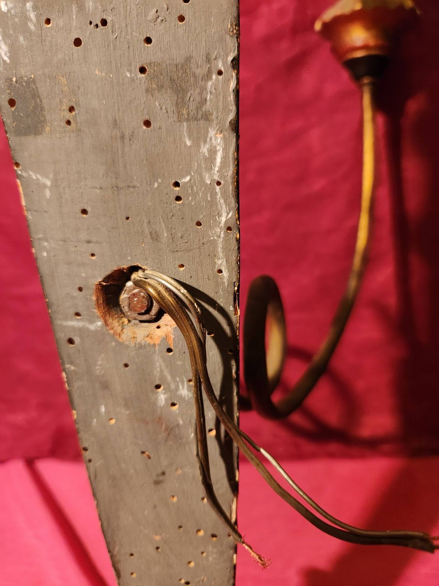 Large antique double wall light in gilded and black wood from the attic