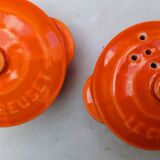 Le Creuset salt and pepper shakers