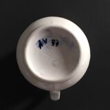 Signed floral decoration pitcher
