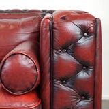 Beautiful red cowhide sleekly designed Chesterfield 2-seater sofa