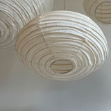 Suspension in rattan and japanese natural linen in the shape of a lantern h50 d30