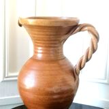Sandstone jug with twisted handle