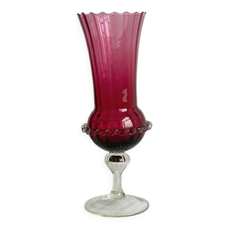 Translucent glass vase on a stand