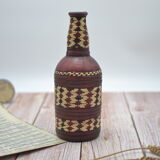 Set of 2 decorative vintage bottles covered with leather & wicker