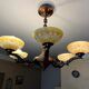 Art deco chandelier in copper with 6 glass tulips.