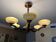Art deco chandelier in copper with 6 glass tulips.