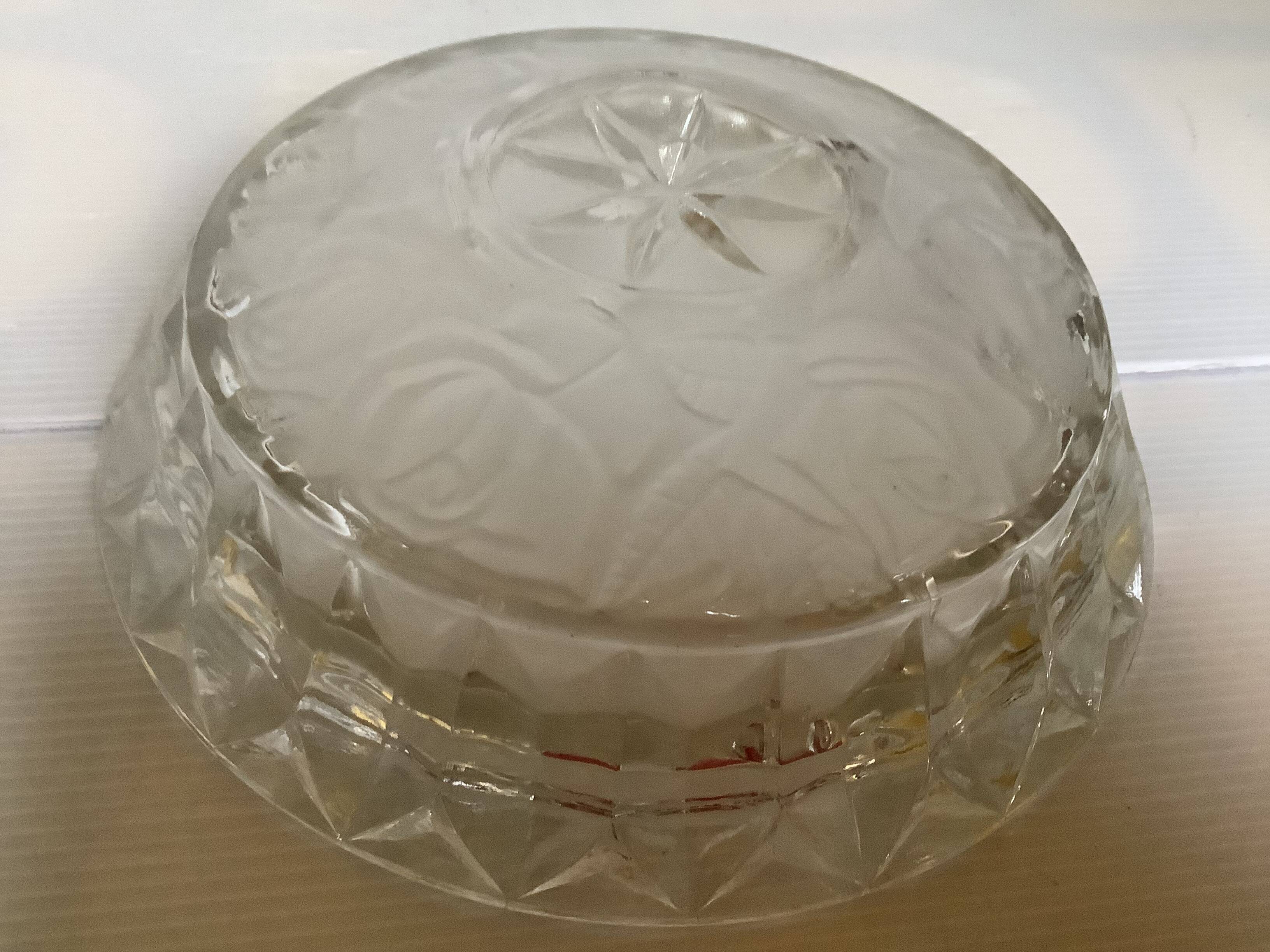 Large glass ashtray with frosted flowers.