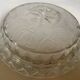 Large glass ashtray with frosted flowers.