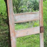 Mirror (3 panels) on door.