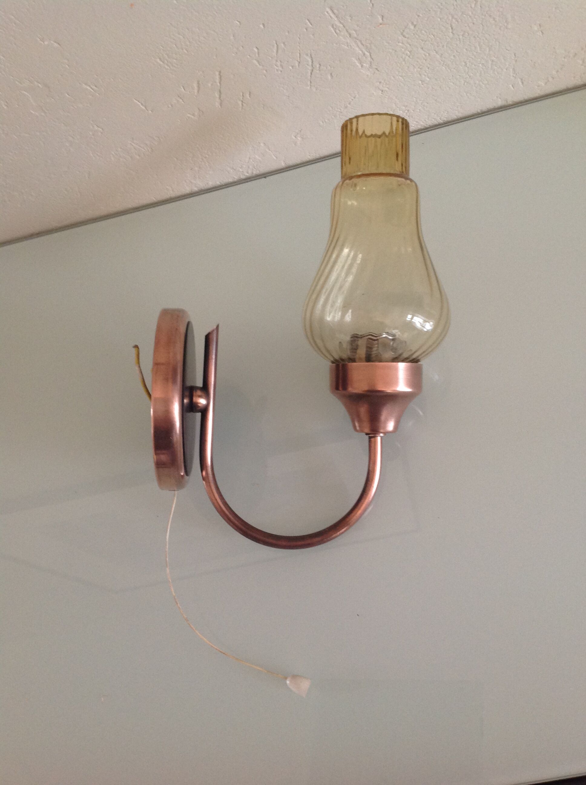 Vintage brass wall and smoked glass