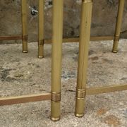 Brass, gold metal and 70s mirror glass tables