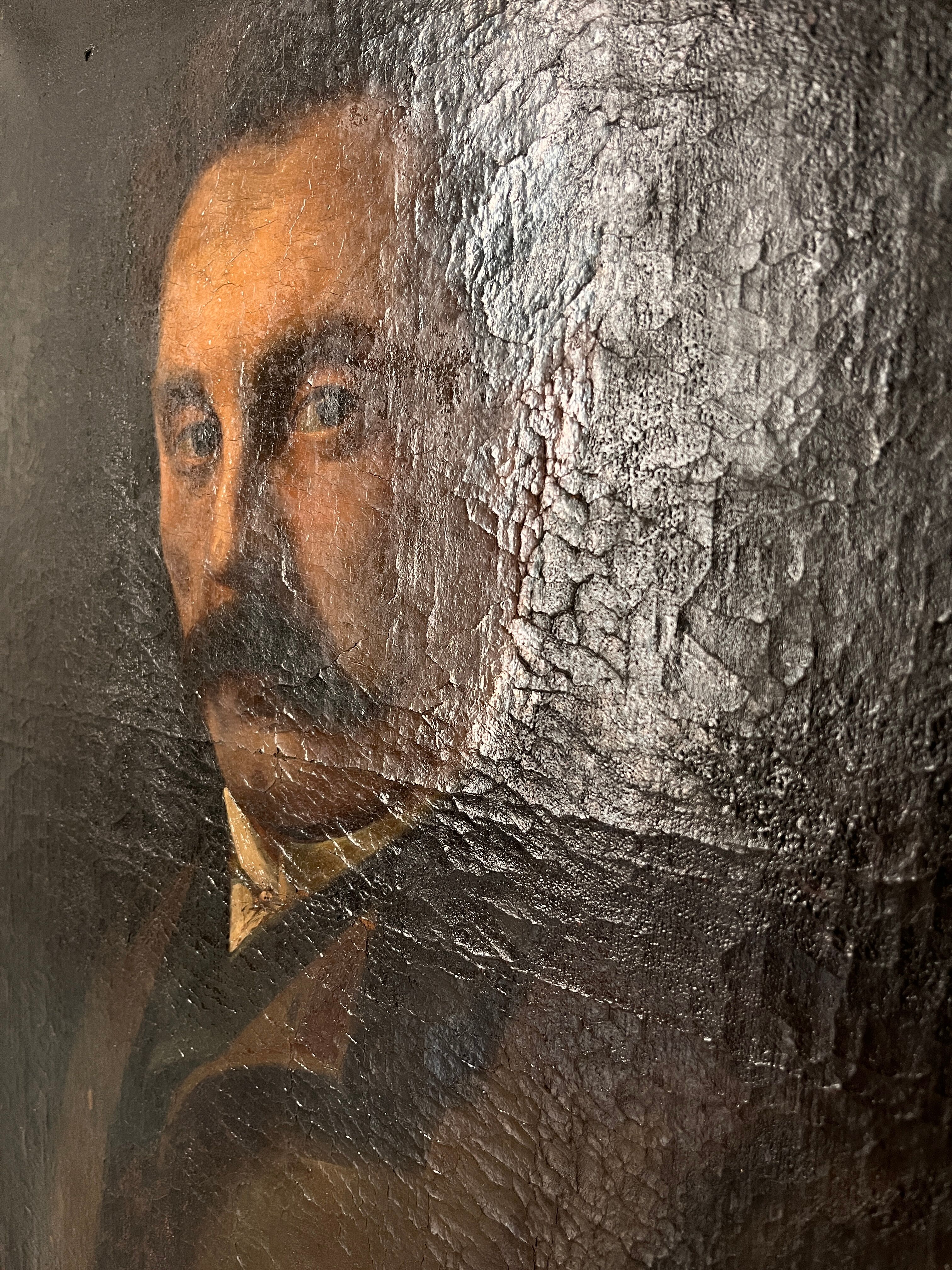 Portrait of a man in oil on canvas from the 19th century, an old painting dated 1885.
