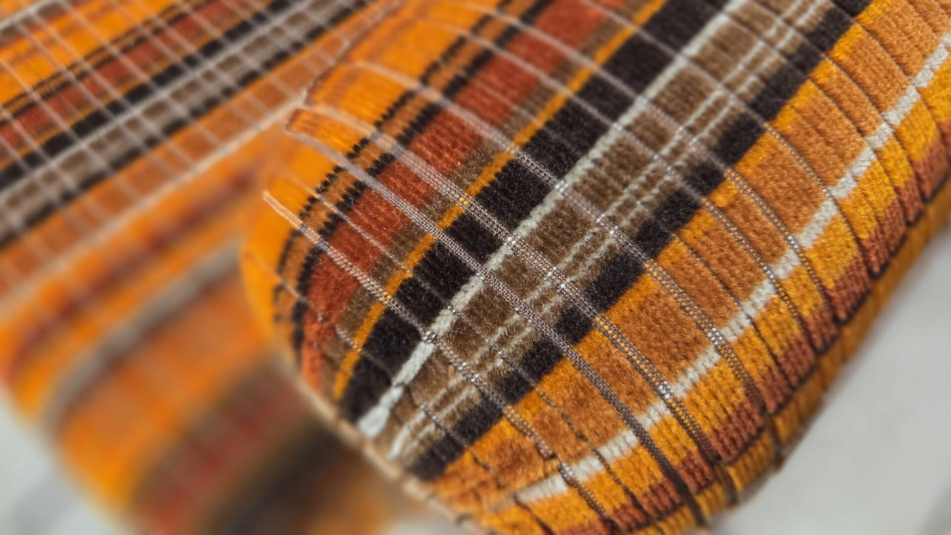 Pair of vintage 1970s modular armchairs – striped orange fabric
