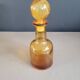Amber molded glass carafe with stopper