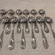 12 silver-plated metal dessert spoons, silversmith SFAM, rocaille design, 19.1 cm.