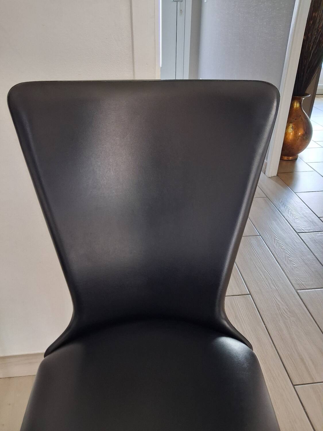 4 black Baumann style chairs
