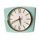 Ceramic trapeze clock of the 50s