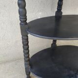 Patinated blackened wood oval gueridon