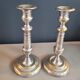 Pair of antique silver-plated brass candlesticks