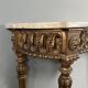 Louis XVI style console in carved wood with a gilded patina, 19th century.