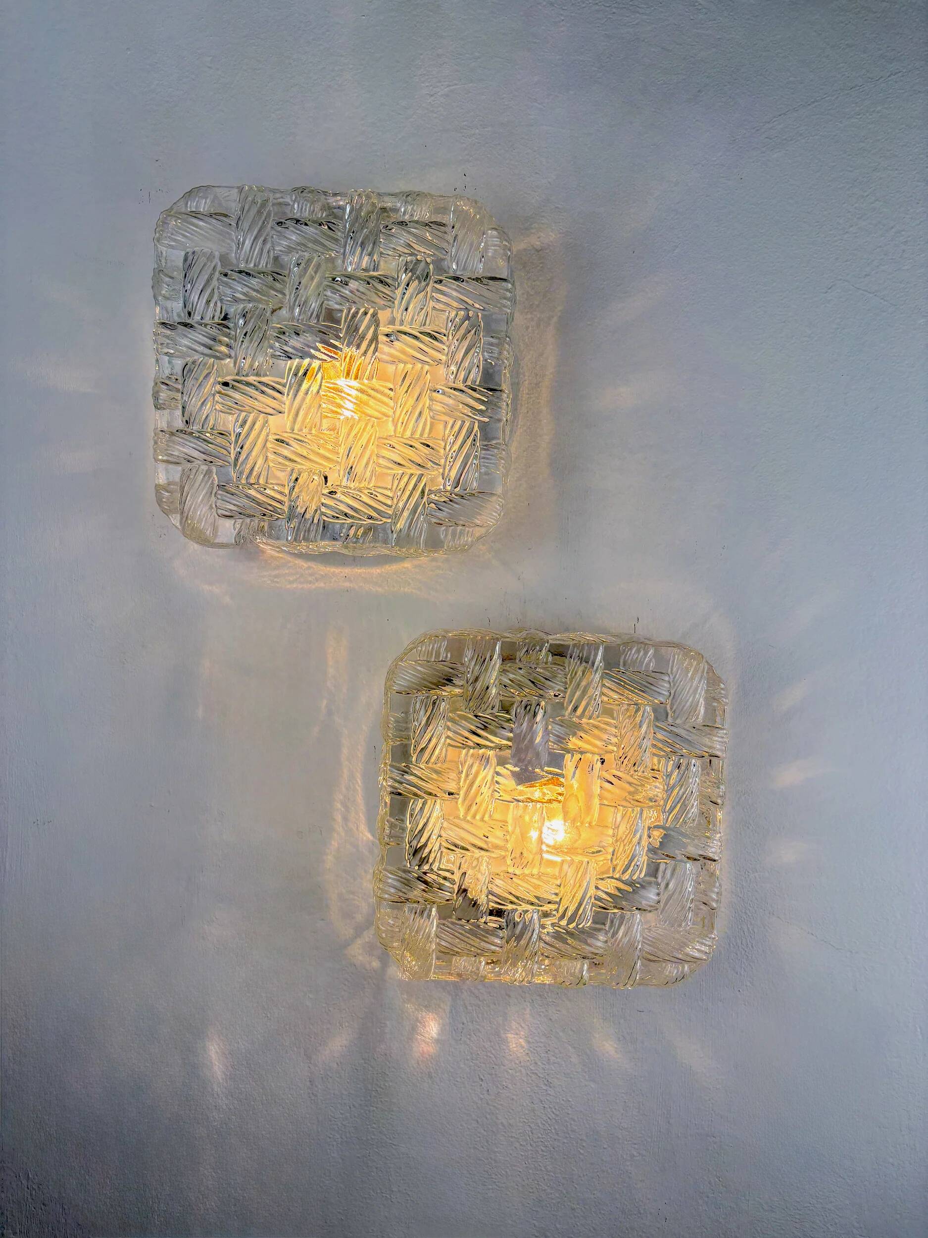 Pair of woven textured glass wall lights by Leuchten, Germany, 1970s