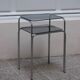 Vintage side table in smoked glass and chromed metal – 70s