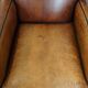 Set of 2 characterful, comfortable armchairs made of sheepskin leather with a sleek Art Deco design