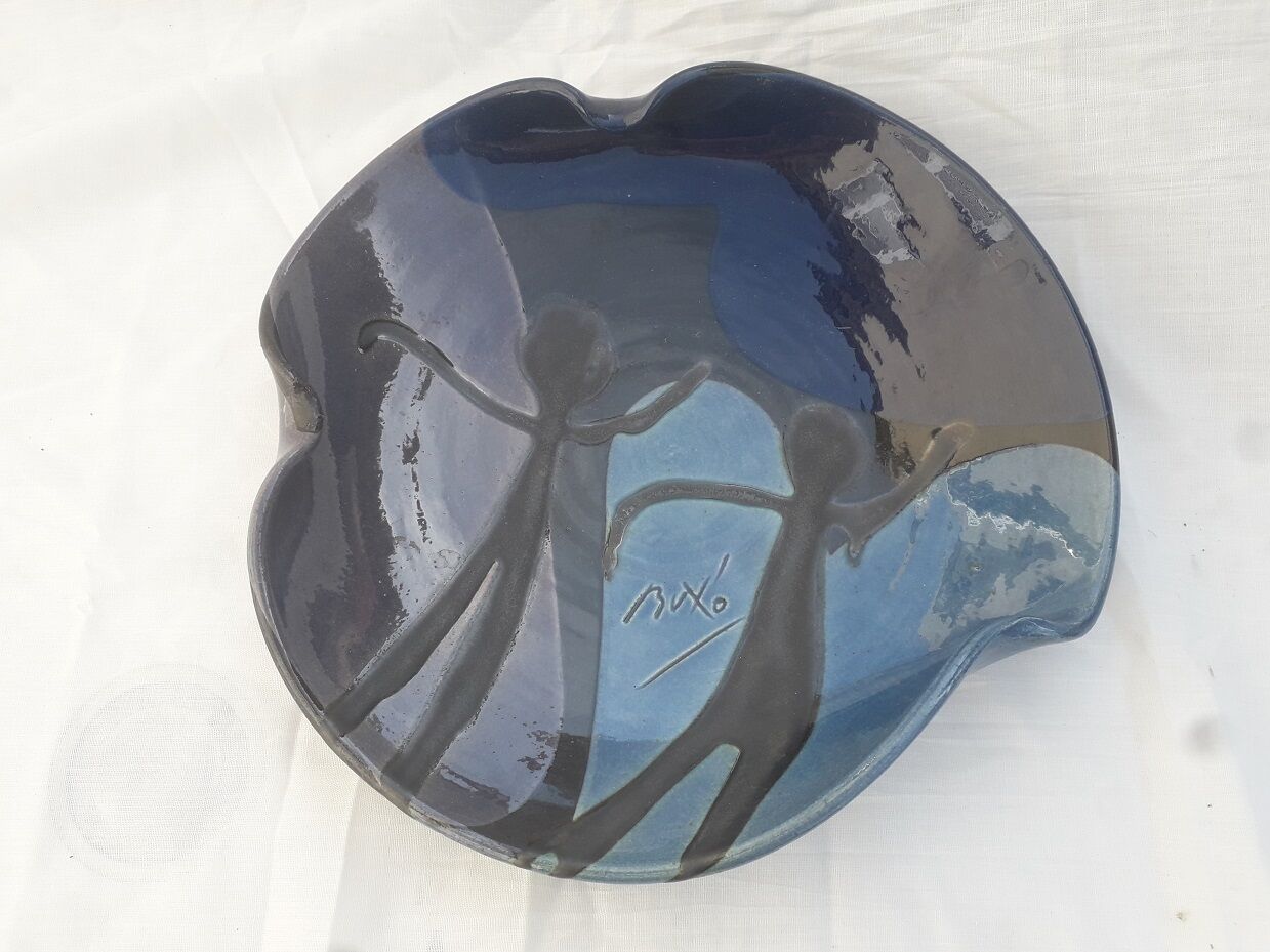 Signed ceramic plate