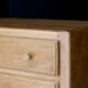 Small art deco chest of drawers in natural wood