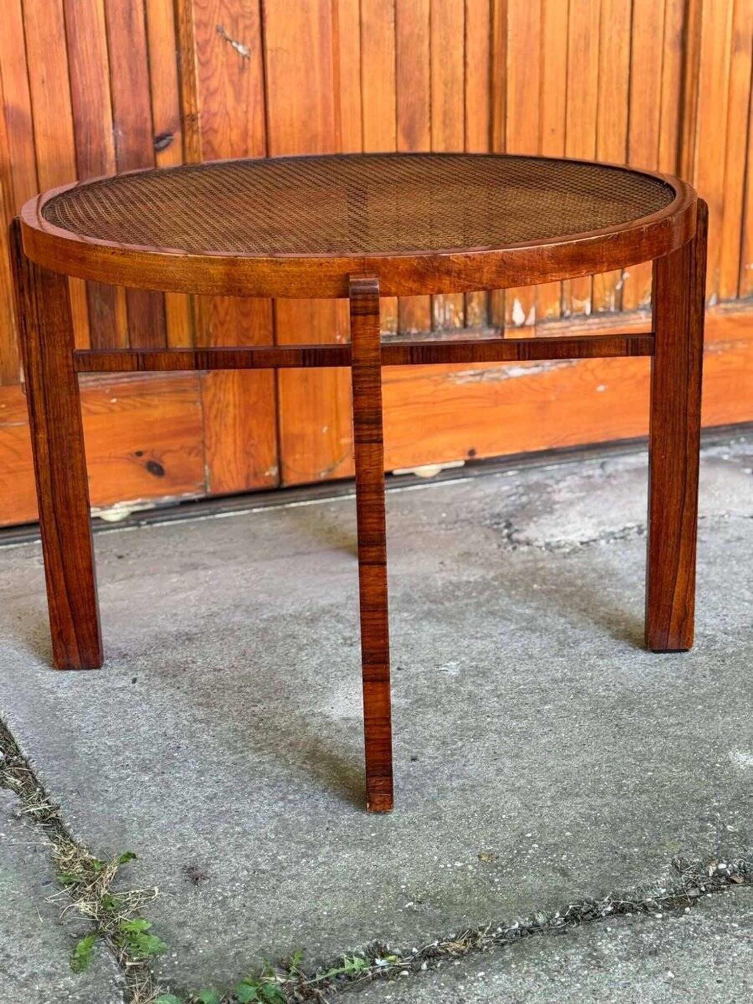 Vintage Art Deco round side table with cane top and walnut wooden frame, 1930s