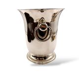 Silver-plated champagne bucket with ring handles.