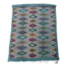 Blue kilim rug with hand-woven geometric patterns